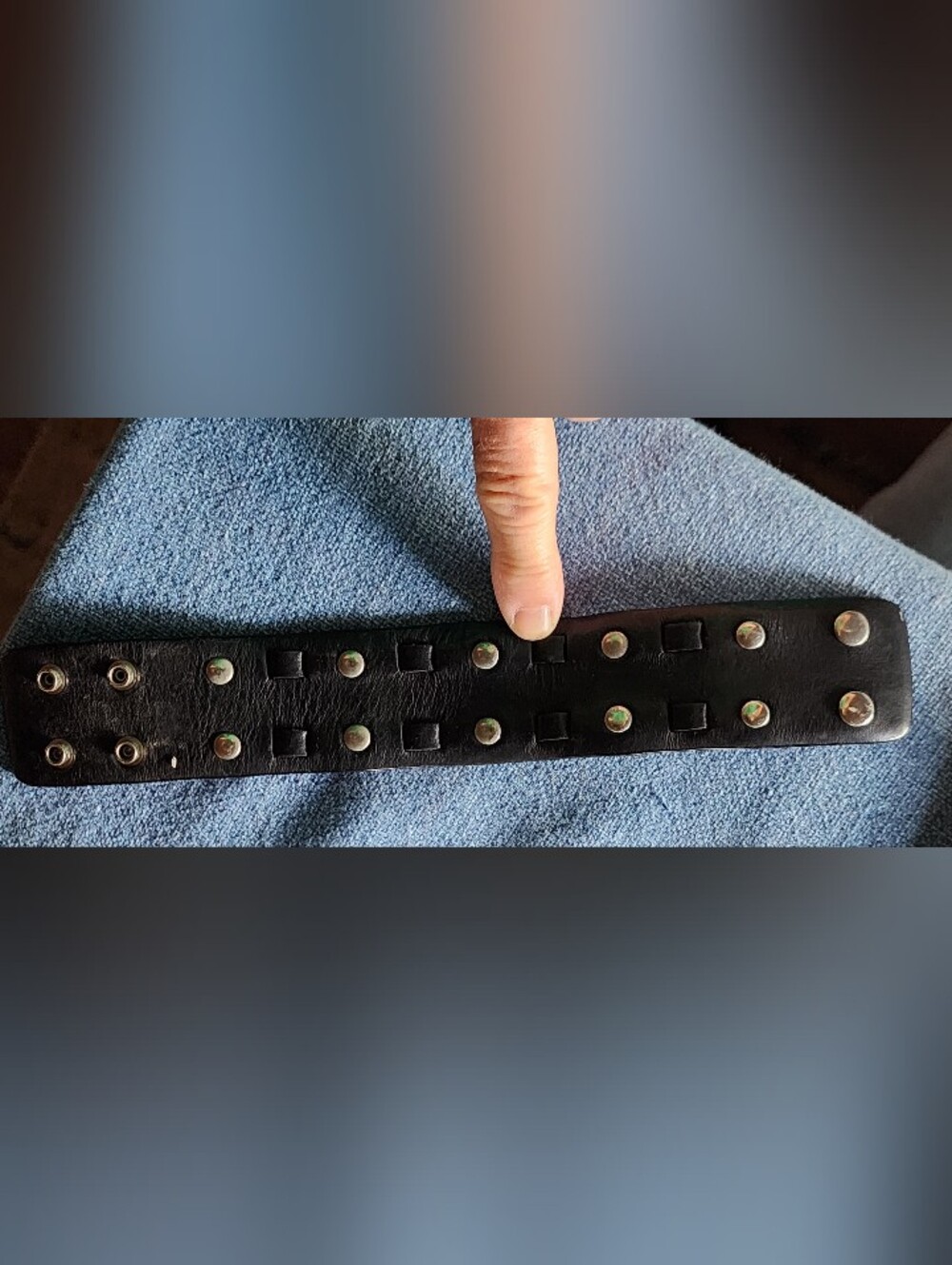Black Leather Snap Bracelet With Silver Rivets.